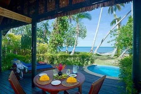 A beachfront bure with a plunge pool overlooking the lagoon at Beqa Island