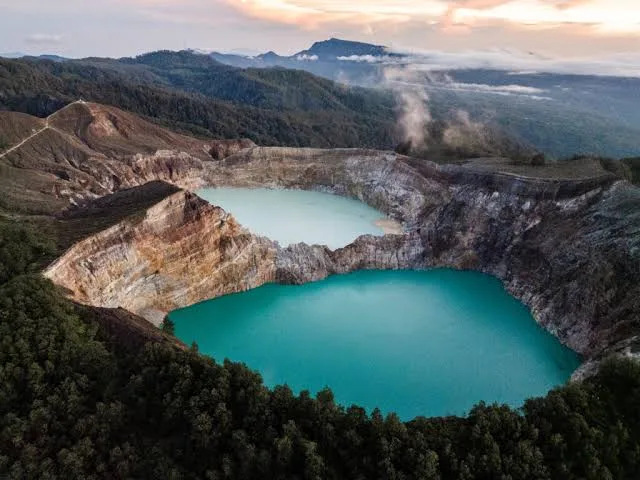 The twin turquoise crater lakes of Kelimutu in Flores