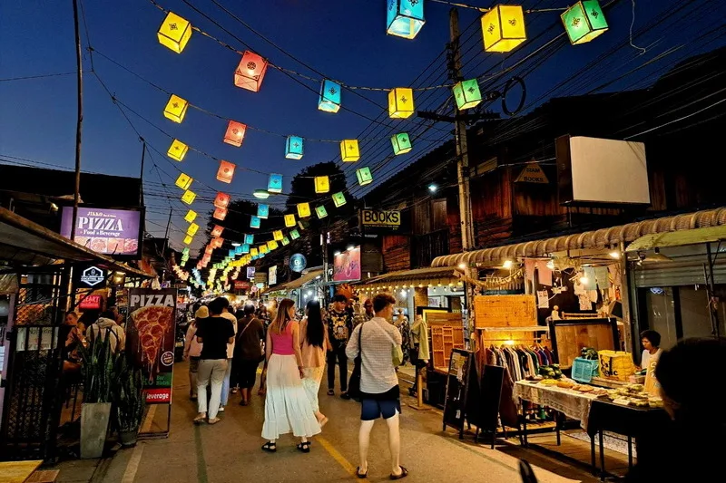 Colourful lanterns strung above Pai Walking Street at dusk